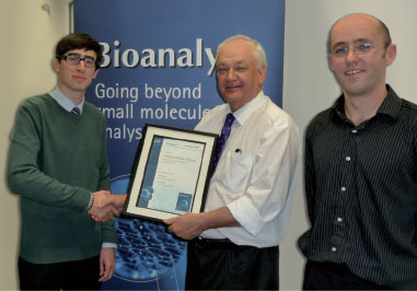 Figure 1. Dr Howard Hill and Ryan De Vooght-Johnson presenting the award to Dr Stephen Holman at The Michael Barber Centre for Mass Spectrometry, University of Manchester, UK (July 2010).