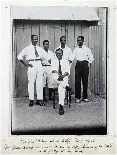 Figure 1 Douala Main Shop Staff, Dec. 1923. George Goethe in the center, Moses on the left, Lharway on the right, two shop boys at the back. (Photographer unknown. Courtesy of Liverpool Central Library and Archive).
