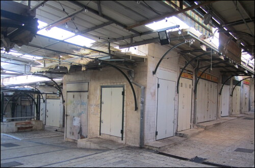 Figure 1. Abandoned sections of the historic market district in Nazareth during the summer of 2013. Photo taken by Daniel Laven.