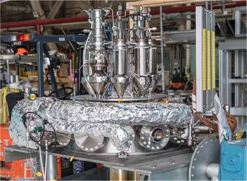 Fig. 4. Stirling engines and simulators attached to vacuum chamber bottom.