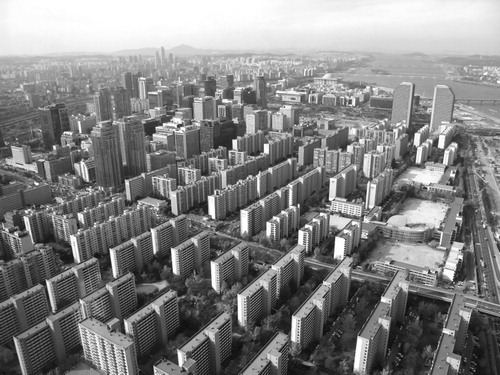 Figure 1. Apartment buildings form an isolated complex in Seoul. Source: FreeQration, http://www.freeqration.com/image/General-View-Korea-Seoul-Seoul-City-photos-2033300