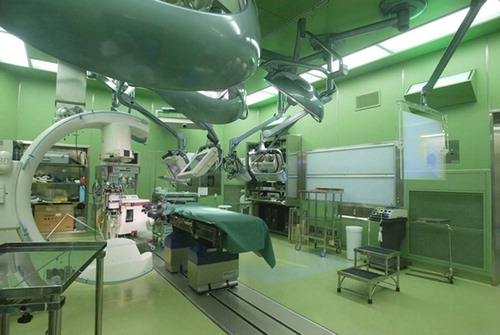 Figure 2. The High-Tech Navigation Operating Room. A mobile 3D-CT can be seen at left. [Color version available online.]