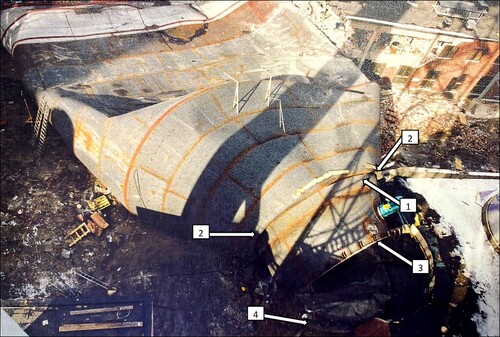 Fig. 3: The tank after collapse:Citation5 (1) steel plate 5; (2) buckling of bottom part of the cone; (3) bar connection to the steel tank; (4) connection bars at the base slab
