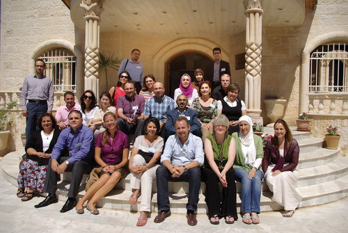 Lecturers and Participants at the Second Translation Studies Workshop, British Institute in Amman, September 2013. Front row, from left: Dr Lamis El Nakkash (Cairo University), Dr Ikrimah Shehab (Najah National University), Prof. Yesim Ebru Diriker (Boğaziçi University), Prof. Mona Baker (University of Manchester), Dr Christopher Rundle (University of Bologna; University of Manchester), Dr Carol O’Sullivan (University of Bristol), Dr Rania Yacoub (Applied Science University (ASU), Dr Carol Palmer (BIA Director). Second row, from left: Mr Mazdak Bolouri (Islamic Azad University, Qazvin Branch), Dr Ahmad Ayyad (Al Quds University), Ms Ayşenaz Koş (Boğaziçi University), Dr Hilal Erkazanci Durmus (Hacettepe University), Mr Khaldun Sughayyar (Palestine Polytechnic University), Dr Mohammed Farrah (Hebron University), Dr Abdul Gabbar Al-Sharafi (Sultan Qaboos University), Dr Nuwar Moulawi Diab (Lebanese American University), Dr Baya Lekkal (University of Algiers 2). Third row, from left: Ms Layal Merhi (The Lebanese University), Dr Marwa El Zouka (Alexandria University), Dr Amal Mohammad AbdelMaqsoud (Ain Shams University), Ms Fatemeh Parham (Allameh Tabataba’i University), Dr Atef Hedhili (Institut Supérieur des Sciences Humaines de Tunis). Standing in the back, from left: Mr Majdi Abu Zahra (Birzeit University), Mr Ali Beikian (Chabahar Maritime University)