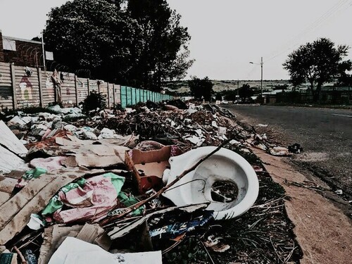 Figure 2. Broken toilet pot. They look at me as if I stink like the toilet pot in the picture. See, most people are readable. It is in the way that they look down on me. It makes me feel small and withdrawn. Photographed by: Johan.