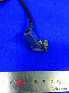 Figure 4. Phased array ultrasonic transducer and wedge for SG small bore piping socket weld inspection.