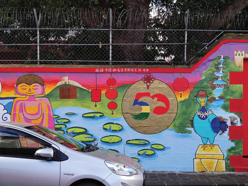 Figure 3. A mural in Port Louis’ Chinatown celebrating the 50th anniversary of diplomatic relations between China and Mauritius (Photo by author).