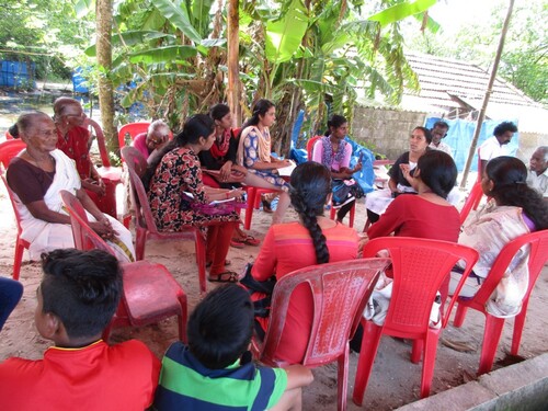 Women discussing the strategies and plans of the protest at the makeshift protest site. The image was taken in June 2018. Children and women of all ages used to gather here to discuss and protest at this spot, which is located right across the Indian Oil Corporation’s Liquefied Petroleum Gas terminal. Source: Carmel Christy K J.