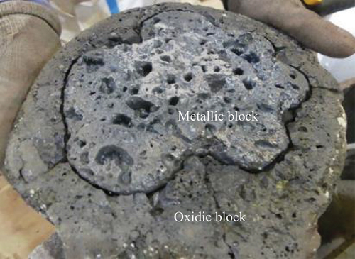 Figure 2. VF-U3 ex-vessel fuel debris prototype: upside-down view of lower part (approximate diameter: 25–26 cm).