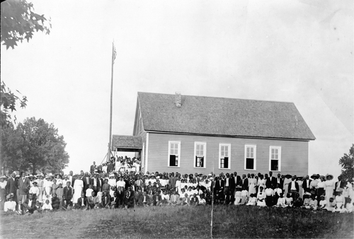 Figure 1. The dedication of the first Rosenwald School, in Loachapoka, Alabama, well attended by community members. Julius Rosenwald Fund Archives, Fisk University Franklin Library, Special Collections.