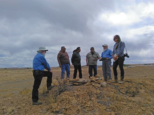 Figure 1. Zuni tribal members working with anthropologists to assess a possible Zuni shrine in the NGWSP area. From left to right: T. J. Ferguson, Eldred Quam, Octavius Seowtewa, Ronnie Cachini, Kurt Dongoske, and Maren Hopkins. Photograph by Michael Spears, May 30, 2018.