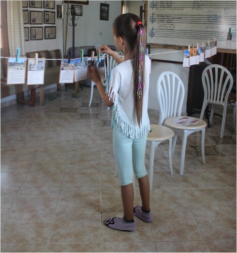 Figure 4. A child using the ‘Historical Timeline’ game. (Photo credit: Gülşen Yegen for FETAV).