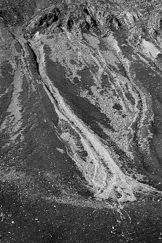 Figure 14 A hillslope debris flow in the Lairig Ghru, Cairngorm Mountains, photographed soon after a heavy rainstorm in 1978 released 71 debris flows into the valley