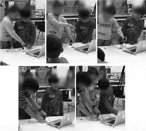 Figure 6. Henry and his classmate observe worms with the digital microscope (top) and together with their teacher discuss what they see on the screen (bottom).