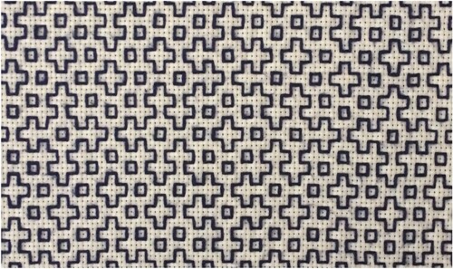 Figure 1. A mathematically-designed stitch pattern for hitomezashi. This piece has been worked on light Aida cloth using dark cotton thread. The traditional roles of dark cloth and light thread have been exchanged.