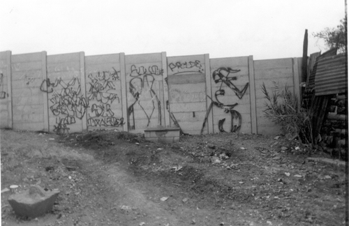 Figure 2. Wall of mara graffiti, Guatemala City: photographed by two groups independently.