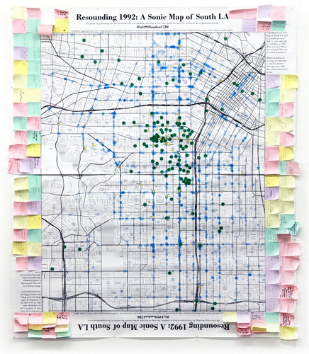 Figure 8. Community annotations feathering the map with Post-it notes relating remembered city sounds located by green dots upon the students’ scavenged archive (yellow) and data on damages in the civil unrest (blue).