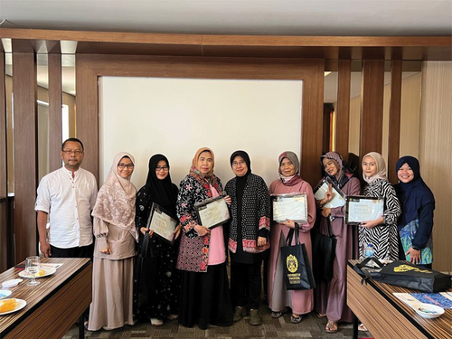 Figure 1. The embroidery entrepreneurs of Tasikmalaya, invited to the focus group discussion in February 8, 2023. From left to right: Dedi Mulyadi, Kania Permata Sukma, Euis Sinta, Atikah, Dr. Linda Sunarti (author), Mimin, Giatry, Risa Ardita, Raisye Soleh Haghia (co-author).