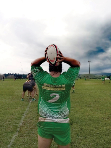Figure 3. Bob playing rugby.