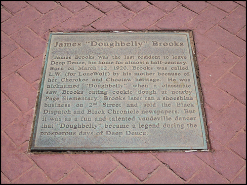 Figure 8. The bronze sidewalk plaque in Deep Deuce that commemorates James Brooks. Photo by Alyson L. Greiner, 2017.