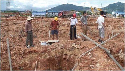 Dr. Zhao (second from right) frequently came to the IUE construction site to urge on its progress. He often invited guests along. Photo credit: Dr. Guofan Shao, June 2007