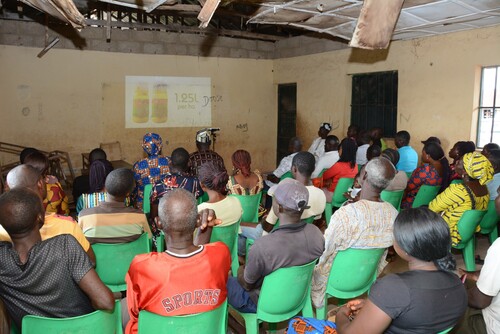 Figure 1. Farmers watching the Six Steps to Cassava Weed Management & Best Planting Practices video in Tarka community, Benue State, Nigeria.