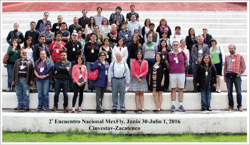 Figure 2. Group photograph of participants at the 2nd MexFly meeting. At the center of the photo in the first row is Victor Salceda. Second from right is Chris Rushlow, who was our invited speaker. The meeting's closing lecture was given by Juan Riesgo (tallest man on the front row). Photo is courtesy of Angel Marín.