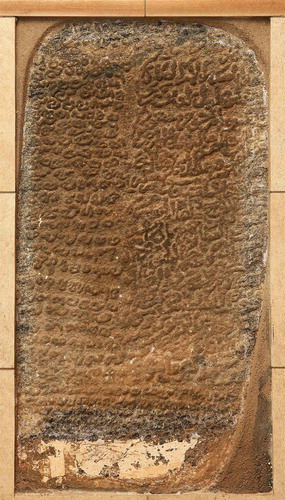 Image 1. A thirteenth-century bilingual inscription (in Arabic and Malayalam) kept at the outer wall of the Muccunti Mosque in Calicut. The Arabic part says that Shihāb al-Dīn Marjān (or Rayḥān), freed slave of the late Masʿūd, endowed the land and commissioned the construction of the mosque