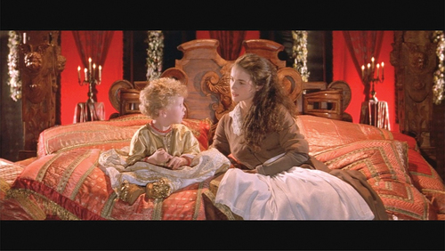 Figure 2. The Baby (Nils Dorando) and the Daughter (Julia Ormond) in The Baby of Mâcon (Allarts Limited, 1993).