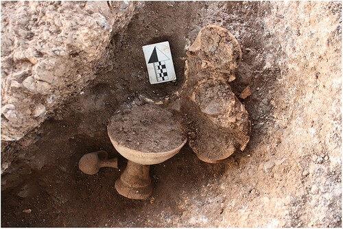Figure 7. Cluster of vessels encircling the head of the deceased on the eastern end of Burial D/F3.