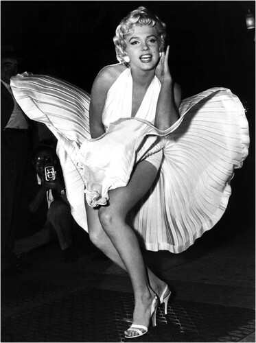 Figure 7. During a publicity shoot for the film The Seven Year Itch, Monroe wears a pleated dress designed to move dramatically. Photo from Wikimedia Commons, originally published by the Associated Press.