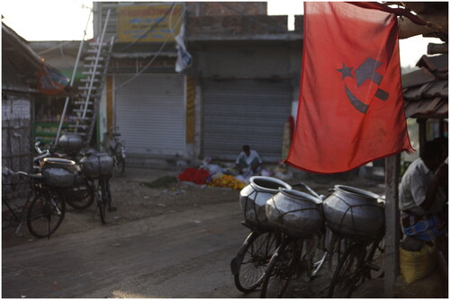 Figure 1. Cargo-cycles parked near a fish auction. Kolkata 2015. Photograph © Malini Sur.