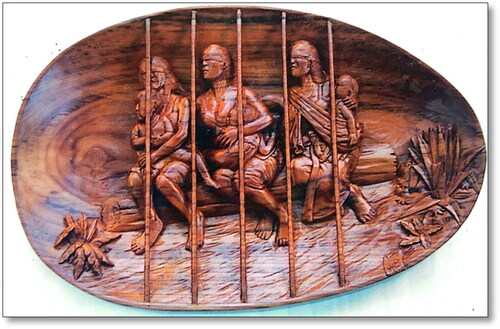 Figure 1. Social confinement.Author: Wahyono.Size: 55 × 37 × 5 cm.Material: Teakwood (2022).
