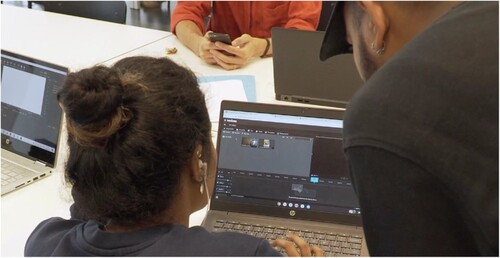 Figure 3. Participants learn and practice editing skills during the workshops.