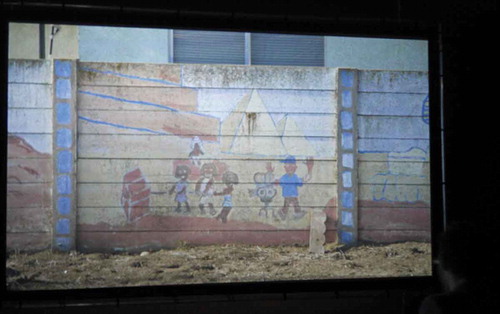 FIGURE 3  Modern ruins? A drawing depicts “fake” pyramids with a film crew. Scene from Brown and Robinson’s The Ten Commandments (2015) taken during the exhibition at The NewBridge Project in Newcastle, October 2015. Photo by author N. Bartolini. (Color figure available online.)