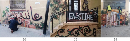 Figure 8. Al Mutamaizoon team painting Palestinian and Jordanian landmarks. (a) displays the phrase ‘’We will return’’ on a Palestinian landmark. (b) shows Palestinian traditional patterns with the ‘’Palestine’’ written on one of the residence homes. It also shows a painting of a woman wearing a Palestinian traditional dress and carrying a water jug on her head- a common task carried out by women in rural areas of Palestine in the past (c) shows the Roman columns in Jerash, a landmark in Jordan, which symbolise harmony with their host country.
