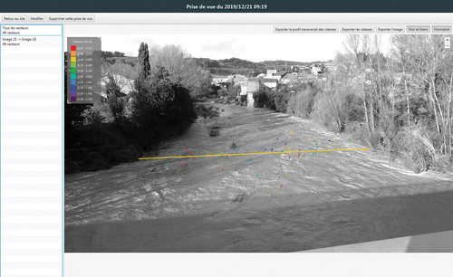 Figure 2. Exemple de pointage des vitesses de surface de part et d’autre de la section bathymétrique (ligne orange), sur la station de l’Ouvèze à Roaix pour la crue du 21/12/2019.