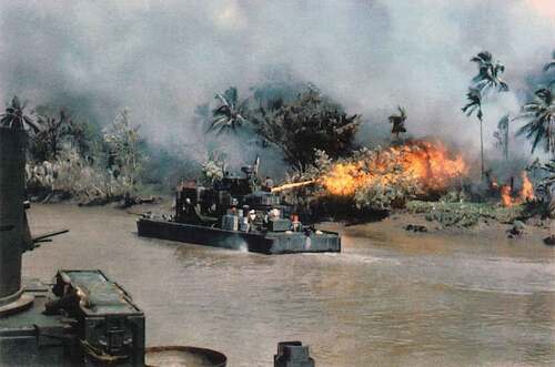 FIGURE 3 U.S. Mobile Riverine Force flamethrower vessel operating in the Mekong River Delta, 1969. During the Vietnam War, American and Vietnamese combatants fought asymmetric warfare in a labyrinth of waterways throughout the Mekong River Delta, a strategic supply corridor for Viet Cong guerrilla fighters in South Vietnam (Smith Citation2020). [Access; Power] (Photo courtesy of Richard Lorman).