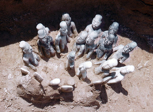 Figure 10.  La Venta Offering 4, Mexico, showing a leader conducting a group ritual, Olmec, Formative Period. Photo: John Clark and Pierre Agrinier.