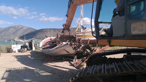 Figure 3. The kaiki Manolis being destroyed by a bulldozer in Koilada, Greece, in 2018. Copyright: Georgia Papadimitriou, reproduced with permission.