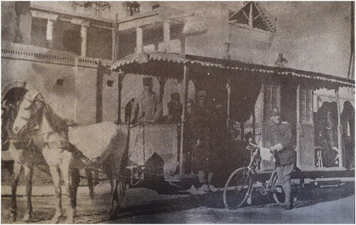 Figure 3 A horse-drawn public tram in Tehran during the early twentieth century. The middle part with sliding doors was allocated to women. Jafar Shahri, Tarikh-e ejtemaee Tehran [Social History of Tehran], Tehran: Entesharat Esmaeelian, Citation1989.