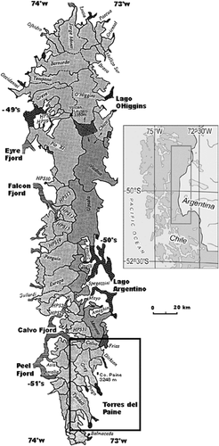 FIGURE 1. Southern Patagonia Icefield and study area. Figure adapted from CitationAniya et al. (1996) showing main glaciers of the SPI and ice divides. Glaciers flowing to the Pacific Ocean are in light gray. Glaciers contributing to the Atlantic Ocean are in dark gray. Dashed lines show areas where the ice divide is uncertain. Area in rectangle is shown in Figure 2