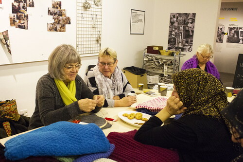 Figure 1 Sunday Pursuits textile craft workshop at The Workers' Museum, Copenhagen. Women from Tingbjerg and women from other parts of Copenhagen get together. Two groups of women who seldom meet, but when doing so, find great pleasure in exchanging knowledge about handicraft techniques. October 2019. Photo: Linda Nørgaard Andersen.