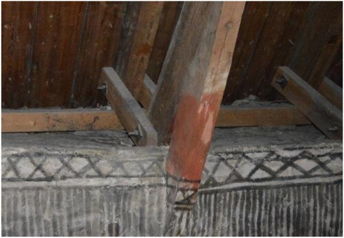 Figure 4. Reinforcement installed in the 1960s: two small wooden elements connecting the main and the secondary rafters.