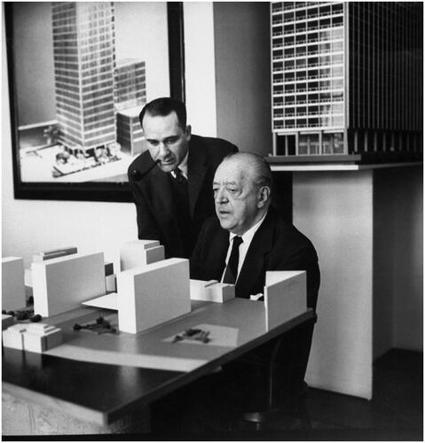 Figure 13. Mies van der Rohe and realtor Herbert Greenwald discussing a model, 1956. © Frank Scherschel, The LIFE Picture Collection/Shutterstock.