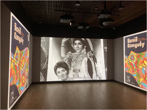 Figure 5. The gallery's multi-screen video display, here showing a South Asian music archive and an album by Sunil Ganguly (Source: Author's image).