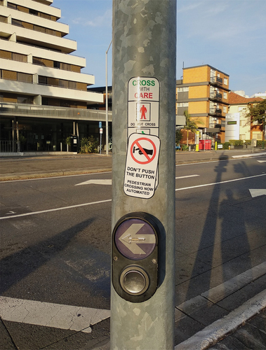 Figure 7. Pedestrian crossing button made automated to prevent touching.