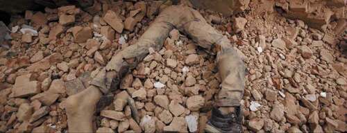Figure 2. Still photograph of bodies buried in rubble, from video of Prakash Katuwal’s “Ayo Barai”.