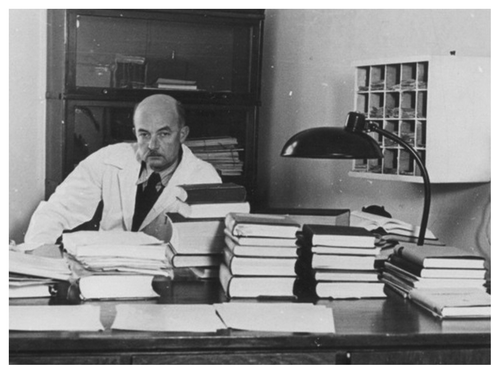 Figure 1. Donhoffer (in his 50s) sitting in his office in the old Department of Pathophysiology.