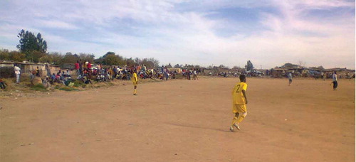 Figure 7. Soccer game underway on the pitch in Kya Sands settlement.Source: Author’s Photograph, Sunday 25 May 2014.